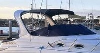 Photo of Larson Cabrio 260 Arch, 2006: Bimini Top, Cockpit Cover, viewed from Starboard Front 