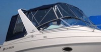 Photo of Larson Cabrio 270, 1999: Arch Bimini Top, Connector, Side Curtains, Camper Top, Camper Side and Aft Curtains, viewed from Starboard Side 