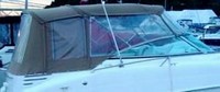 Photo of Larson Cabrio 274, 2003: Bimini Top, Front Connector, Side Curtains, Camper Top, Camper Side and Aft Curtains, viewed from Starboard Side 