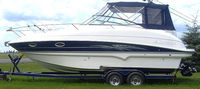 Photo of Larson Cabrio 274, 2007: Bimini Conector, Side Curtains, Camper Top, Camper Side Curtains, Camper Aft Curtain, viewed from Port Side 