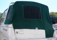 Photo of Larson Cabrio 290, 1999: Bimini Side Curtains, Camper Top, Camper Side and Aft Curtains, viewed from Port Rear 