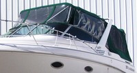 Photo of Larson Cabrio 290, 1999: Bimini Top, Connector, Side Curtains, Camper Top, Camper Side and Aft Curtains, viewed from Port Front 