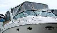 Photo of Larson Cabrio 290, 2000: Bimini Top, Connector, Side Curtains, Camper Top, Camper Side Curtains, viewed from Starboard Front 