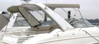Photo of Larson Cabrio 310, 2003: Bimini Top, Arch Connections, Camper Top, viewed from Starboard Rear 