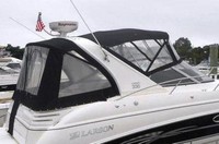 Photo of Larson Cabrio 330 Mid Cabin, 2008: Bimini Top, Front Visor, Side Curtains, Camper Top, Camper Side and Aft Curtains, viewed from Starboard Rear 
