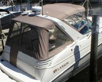 Photo of Larson Cabrio 330, 2002: Arch Connections Bimini Top, Side Curtains, Camper Top, Camper Side and Aft Curtains, viewed from Starboard Rear 