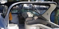 Photo of Larson Cabrio 370 Mid Cabin, 2009: Bimini Top, Front Connector, Side Curtains, Aft Curtain Connection Strip, viewed from Port Rear 