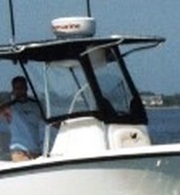 Photo of Mako 234CC, 2006: Factory T-Top, Front Spray Visor T-Top, Side Curtains, viewed from Starboard Front 
