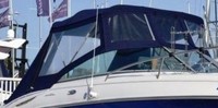 Photo of Monterey 248 LSC Montura Cuddy, 2005: Bimini Top, Front Connector, Side and Aft Curtains, viewed from Starboard Front 