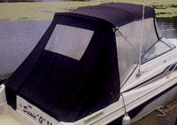 Photo of Monterey 256 Cruiser, 1996: Bimini Top, Front Connector, Side Curtains Bimini Aft Curtain, viewed from Starboard Rear 