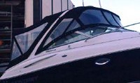 Photo of Monterey 265 Cruiser, 2004: Bimini Top, Front Connector, Side Curtains, Arch-Aft-Top, Camper Top, Camper Side and Aft Curtains, viewed from Starboard Front 