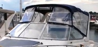 Photo of Monterey 276 Cruiser Arch, 1998: Bimini Top Valance, Front Visor, Side Curtains, viewed from Port Front 