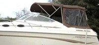 Photo of Monterey 276 Cruiser No Arch, 1998: Bimini Top, Camper Top, Camper Side and Aft Curtains, viewed from Port Side 