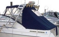 Photo of Monterey 276 Cruiser No Arch, 1999: Bimini Top, Front 3 Panel Visor, Side Curtains, Aft Curtain Radar Arch, viewed from Port Rear 