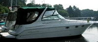 Photo of Monterey 322 Cruiser, 2000: Bimini Visor, Side Curtains Radar Arch Camper Top, Camper Side and Aft Curtains, viewed from Starboard Side 