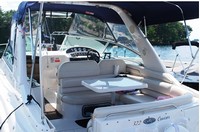 Photo of Monterey 322 Cruiser, 2003: Bimini Top, Connector zipped open, Side Curtains, Arch-Aft-Top, Camper Top, viewed from Port Rear, Inside 