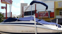 Photo of Regal, 2000-2007: Bimini Top in Boot, Bow Cover Cockpit Cover, viewed from Port Rear 