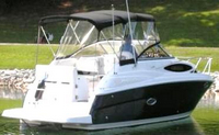 Photo of Regal 2565, 2006: Bimini Top, Front Visor, Side Curtains, Camper Top, viewed from Starboard Rear 