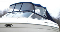 Photo of Regal 2850, 2000: Bimini Top, Front Visor, Side Curtains, Aft Curtain, viewed from Port Front 