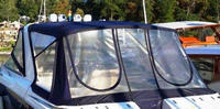 Photo of Regal 3350, 2007: Full Camper Canvas wet, viewed from Port Rear 