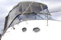 Photo of Regal Commodore 2465, 2005: Bimini Top, Front Visor, Side Curtains, Camper Top, Camper Side and Aft Curtains, viewed from Starboard Front 