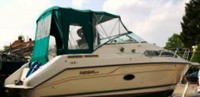 Photo of Regal Commodore 252, 1993: Bimini Top, Visor, Side Curtains, Camper Top, Camper Side and Aft Curtains, viewed from Starboard Rear 
