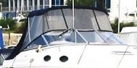 Photo of Regal Commodore 258, 1996: Bimini Top, Front Connector, Side Curtains, Aft Curtain, viewed from Starboard Front 