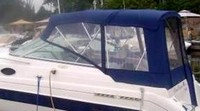 Photo of Regal Commodore 258, 1996: Bimini Top, Front Connector, Side Curtains, Camper Top, Camper Side and Aft Curtains, viewed from Port Side 