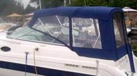 Photo of Regal Commodore 258, 1997: Bimini Top, Front Connector, Side Curtains, Camper Top, Camper Side and Aft Curtains, viewed from Port Side 