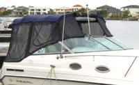 Photo of Regal Commodore 258, 1997: Bimini Top, Front Connector, Side Curtains, Camper Top, Camper Side and Aft Curtains, viewed from Starboard Front 