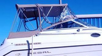 Photo of Regal Commodore 258, 1998: Bimini Top, Front Connector, Side Curtains, Camper Top, Camper Side Curtains, viewed from Starboard Side 