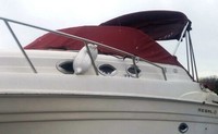 Photo of Regal Commodore 2660, 2001: Bimini Top in Boot, Cockpit Cover with Bimini Frame Cutouts, viewed from Port Front 