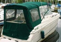 Photo of Regal Commodore 2660, 2001: Bimini Top, Front Visor, Side Curtains, Camper Top, Camper Side and Aft Curtains, viewed from Starboard Rear 