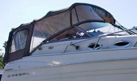 Photo of Regal Commodore 2660, 2001: Bimini Top, Front Visor, Side Curtains, Camper Top, Camper Side and Aft Curtains, viewed from Starboard Side 