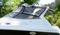 Photo of Regal Commodore 2860, 2005: Bimini Top, Front Visor set, Side Curtains, Camper Top, viewed from Port Side 