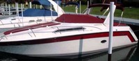 Photo of Regal Commodore 300 Arch, 1993: Bmini Top in Boot, Camper Top in Boot Sunpad Cover Cockpit Cover with Camper Curtouts, viewed from Port Front 