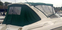 Photo of Regal Commodore 322, 1998: Radar Arch Bimini Top, Front Visor, Side Curtains, Camper Top, Camper Side Curtains, Camper Aft Curtains, viewed from Starboard Rear 