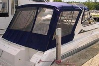 Photo of Regal Commodore 402, 1998: Bimini Top, Front Visor, Side Curtains, Camper Top, Camper Side and Aft Curtains, viewed from Starboard Rear 