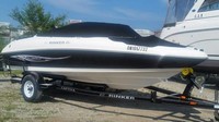 Photo of Rinker 192 Captiva, 2008: Bimini Top in Boot, Bow Cover Cockpit Cover, viewed from Starboard Bow 