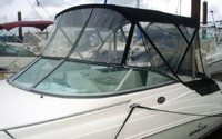 Photo of Rinker 230 Atlantic, 2008: Factory OEM Bimini Top, Connector, Side Curtains, Aft Curtain, viewed from Port Front 