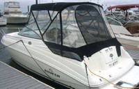 Photo of Rinker 230 Atlantic, 2008: Factory OEM Bimini Top, Connector, Side Curtains, Aft Curtain, viewed from Port Rear 