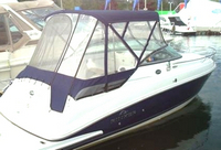 Photo of Rinker 230 Atlantic, 2008: Factory OEM Blue Bimini Top, Connector, Side Curtains, Aft Curtain, viewed from Starboard Rear 