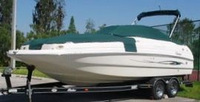 Photo of Rinker 243 Flotilla, 2001: Factory OEM Bimini Top, Bow Cover Cockpit Cover, viewed from Port Front 