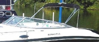 Photo of Rinker 246 Captiva Cuddy, 2007: Bimini Top in Boot, viewed from Port Bow 