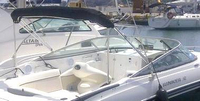 Photo of Rinker 246 Captiva Cuddy, 2007: Bimini Top in Boot, viewed from Starboard Rear 