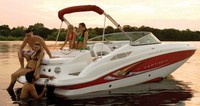 Photo of Rinker 248DB Captiva, 2008: Bimini Top in Boot (Factory OEM website photo), viewed from Starboard Rear 
