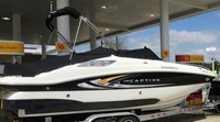 Photo of Rinker 248DB Captiva, 2009: Bimini Top in Boot, Cockpit Cover, viewed from Starboard Rear 