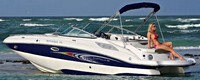 Photo of Rinker 248DB Captiva, 2009: Bimini Top in Boot (Factory OEM website photo), viewed from Port Rear 