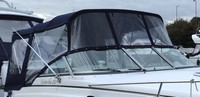 Photo of Rinker 250 Fiesta Vee, 2002: Bimini Top, Connector, Side Curtains, Camper Top, Camper Side and Aft Curtains, viewed from Starboard Front 