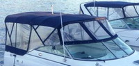 Photo of Rinker 270 Express Cruiser, 2007: No Arch Bimini Top, Front Connector, Side Curtains, Camper Top, Camper Side Curtains, viewed from Starboard Front 